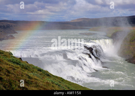 Gullfoss-waterfall at the Hvita-river in Iceland with rainbow in evening light - Iceland, Europe Stock Photo