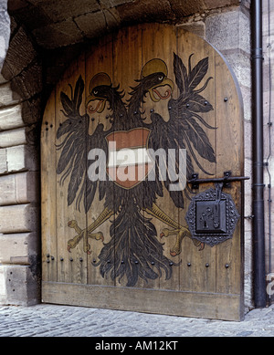 Coat of arms ( heraldic sign ) double-eagle painted at the gate of the Imperial Castle ( Kaiserburg ), Nuremberg, Frankonia, Ba Stock Photo