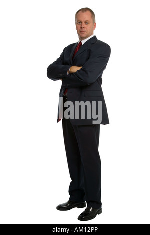 Confident businessman wearing a suit with his arms folded Stock Photo