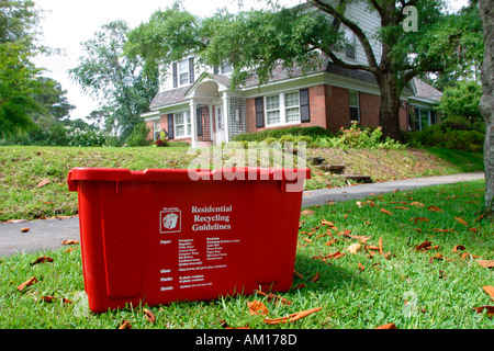 Recycling Bin on Curb in Neighborhood Stock Photo