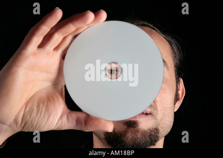 Hand holding CD Stock Photo