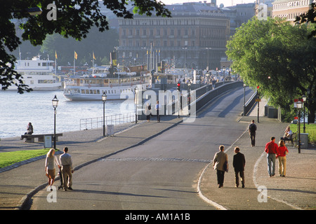 Ferryboats near bridge to Skeppsholmen in Stockholm Stock Photo