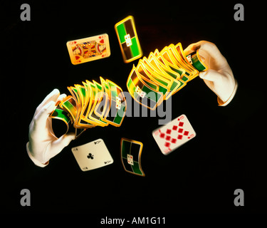 Magician doing card tricks Stock Photo