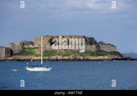 Yacht anchored in front of Castle Cornet, St Peter Port, Guernsey, Channel Islands Stock Photo