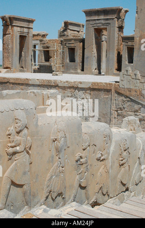 Slaves and soldiers carry gifts for Persian Emperor in Darius palace stairs PERSEPOLIS Iran Stock Photo