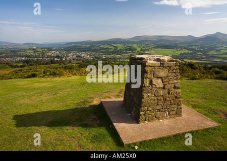 Trig point at the top of Pen y Crug hillfort overlooking Brecon and the Usk valley Brecon Beacons National Park Wales Stock Photo