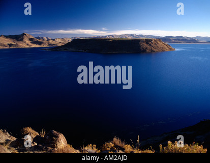 PERU South America Puno Administrative Department Sillustani Lake Ayumara with island in the centre of the blue water Stock Photo