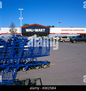 Blue shopping carts in a Walmart store parking lot North America Stock Photo