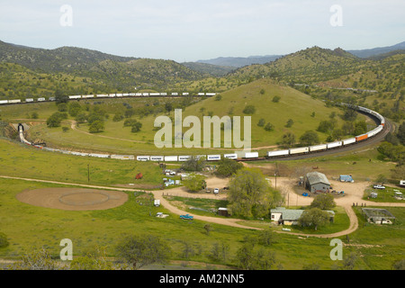 The Tehachapi Train Loop near Tehachapi California is the historic location of the Southern Pacific Railroad where freight Stock Photo