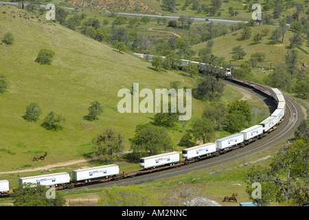 The Tehachapi Train Loop near Tehachapi California is the historic location of the Southern Pacific Railroad where freight Stock Photo