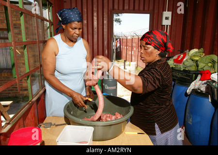 Women cooking in a so-called soup kitchen, Cape Town, South Africa Stock Photo