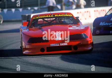 A red Mazda Trans AM in the Toyota Grand Prix Car Race in Long Beach CA Stock Photo