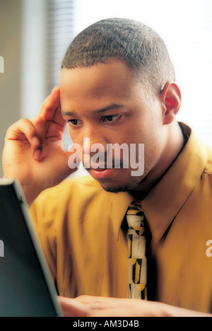 african american business man on phone in office Stock Photo