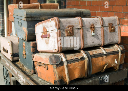 Stacked luggages on a railway station Stock Photo