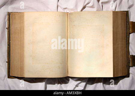 A very old open book with blank pages. Stock Photo