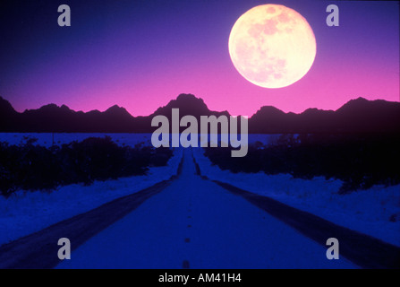 Moonrise over an alien landscape Stock Photo