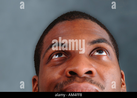 African American face looking up up close and cropped Stock Photo