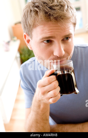 man drinking black coffee Stock Photo