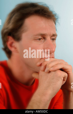 A man looking pensive stressed and worried Stock Photo