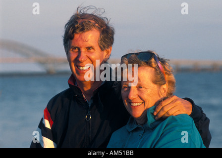 senior couple embrace near the sea Stock Photo