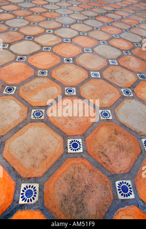 ceramic terra cotta Spanish tile floor Stock Photo