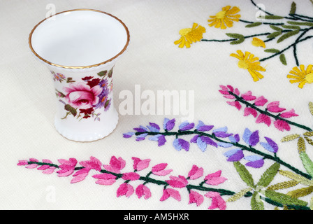 Hand Embroidery and Royal 'Crown Derby' vase Stock Photo