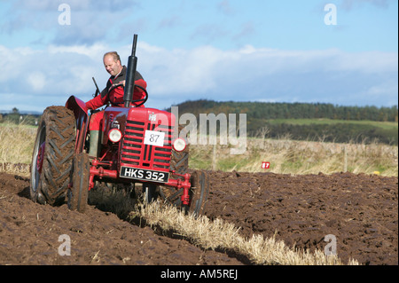 Tractor ploughing at the 2007 Scottish Ploughing Championships held at Pusk Farm, Balmullo, St Andrews, Fife, Scotland, UK Stock Photo