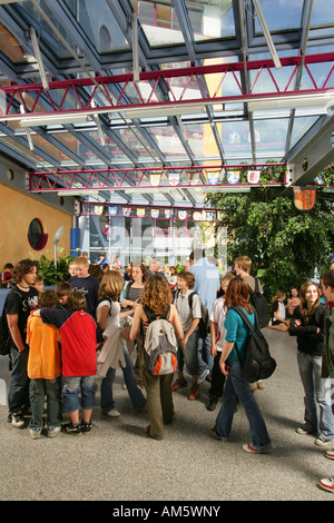 Pupils in the break hall of a modern school, Waldkraiburg, Upper Bavaria, Bavaria, Germany Stock Photo