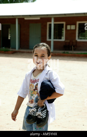 Girl in schoolyard, Loma Plata, Chaco, Paraguay, South America Stock Photo