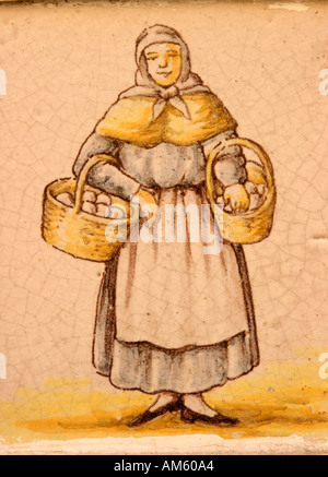 Spain Ceramic tile showing peasant woman Stock Photo