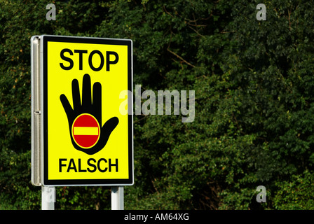 Warning sign for wrong-way drivers at motorway exit, Austria Stock Photo