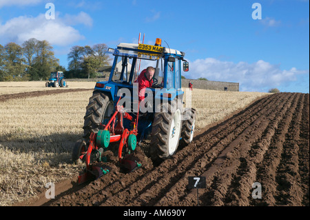 Tractor and plough at the 2007 Scottish Ploughing Championships held at Pusk Farm, Balmullo, St Andrews, Fife, Scotland, UK Stock Photo