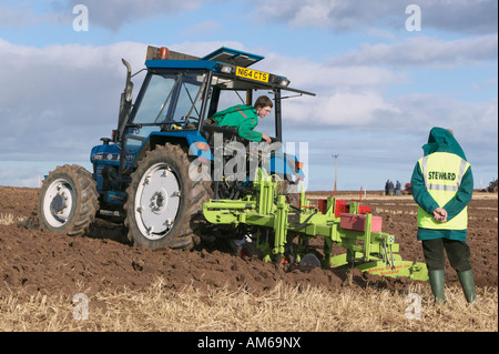 Tractor ploughing at the 2007 Scottish Ploughing Championships held at Pusk Farm, Balmullo, St Andrews, Fife, Scotland, UK Stock Photo