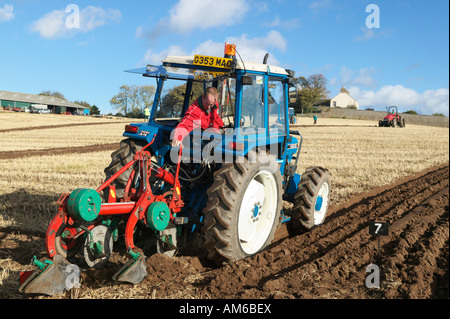 Tractor and plough at the 2007 Scottish Ploughing Championships held at Pusk Farm, Balmullo, St Andrews, Fife, Scotland, UK Stock Photo