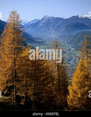 View from Moesern to the Inntal, right hand Mieminger Kette and Hohe Munde, larches in autumn, Tyrol, Austria Stock Photo