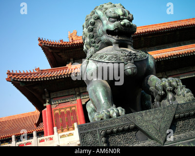 A guardian lion statue in the Forbidden City in Beijing China. Stock Photo