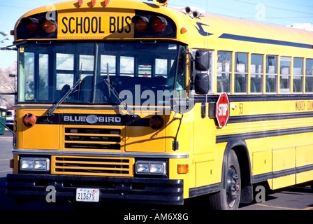 An image of a bright yellow, empty school bus. Could illustrate concepts of school, education, child safety, kid's future,, etc. Stock Photo