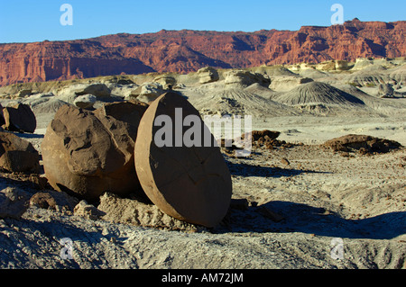 The valley floor in Ischigualasto Provincial park strewn with large boulders and strange rock formations Stock Photo