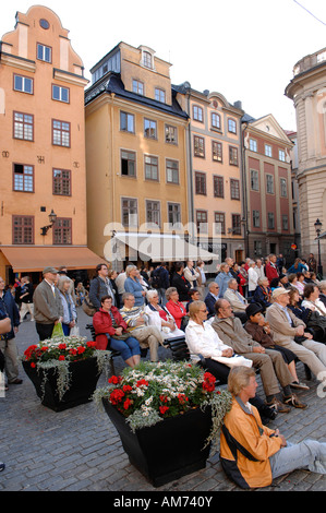 Spectators in front of open-air theatre in the old town, Stockholm, Sweden Stock Photo