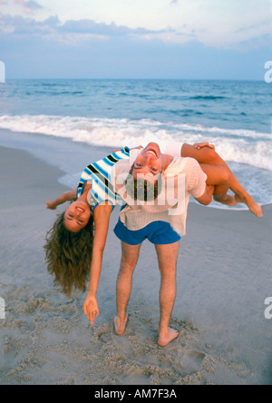 Filipino couple at the beach and yoga poses Stock Photo | Adobe Stock