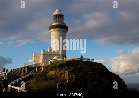 Byron Bay Lighthouse in Australia on a beautiful day with white puffy clouds passing through Stock Photo