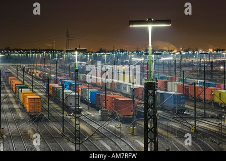 Parked freight trains at Maschen railroad shunting yard near Hamburg at night, Lower Saxony, Germany Stock Photo