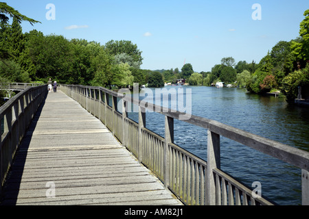 View from Henley weir footbridge looking downstream towards Henley town Stock Photo