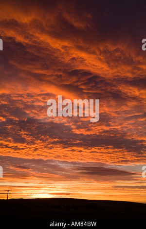 dh  CLOUDS BACKGROUND Red Orange grey and cloudscape sunset sky clear atmospheric background Stock Photo