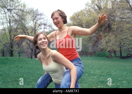 Sister's enjoying at park, portrait Stock Photo