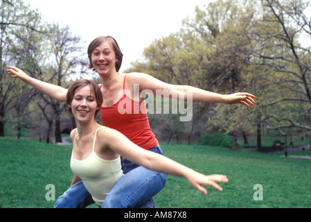 Sister's enjoying at park, portrait Stock Photo