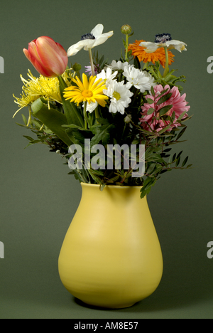 Rustic flowers bouquet in a vase Stock Photo