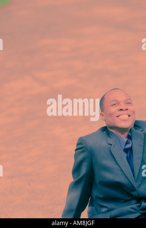 Businessman smiling, looking away Stock Photo