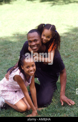 Father with daughters, portrait Stock Photo