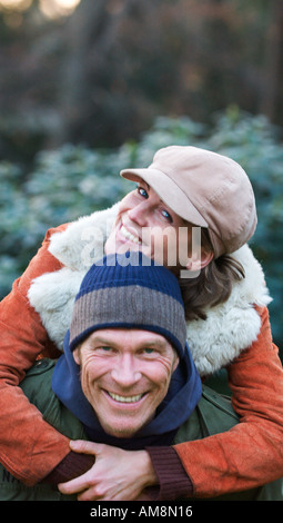 happy middle aged heterosexual couple outdoors in the fall Stock Photo